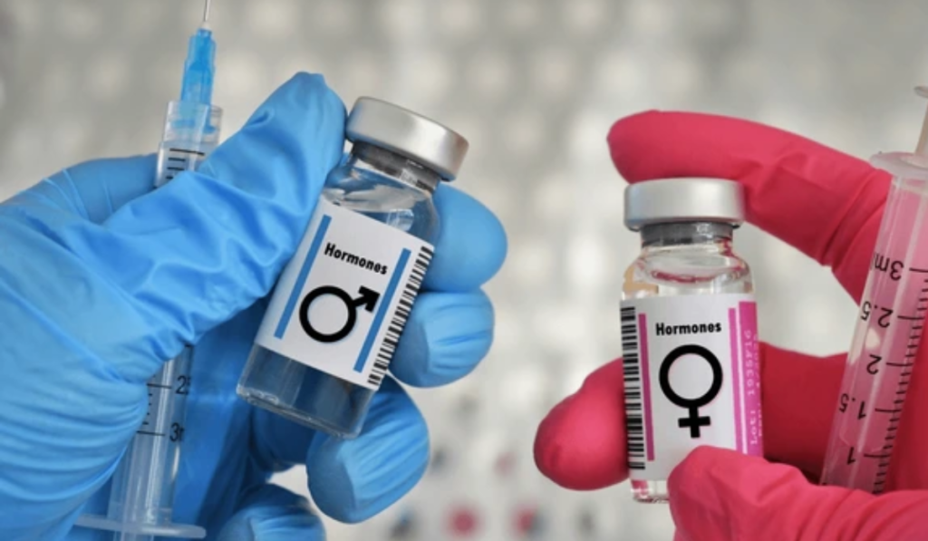 2 viles that say hormone replacement